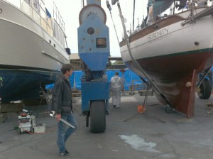 Getting our prop shaft pulled by our good friend Michael (the guy with the giant wrench)